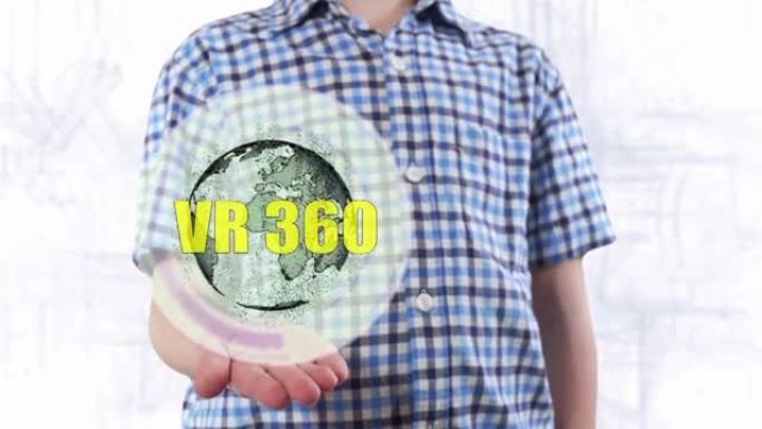 年轻人展示了地球的全息图和文字VR 360