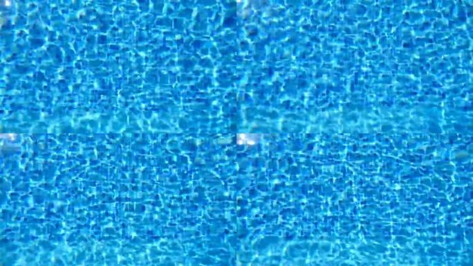 游泳池里有蓝色的水。美丽的背景。特写