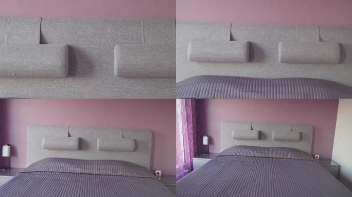卧室内床的灰色床头板