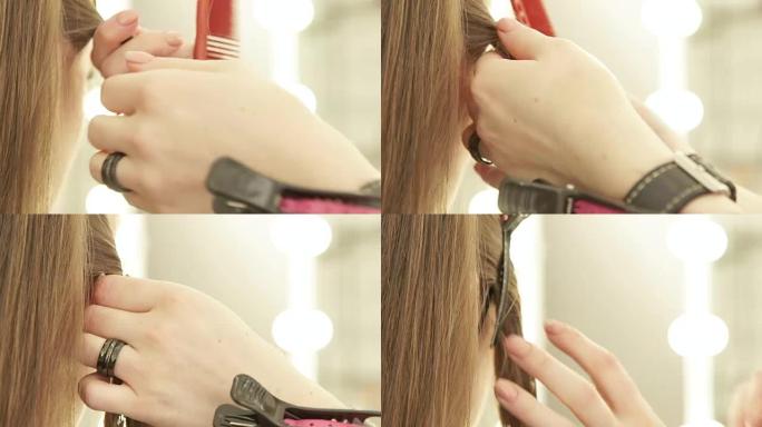 美发沙龙女性理发时使用发夹固定头发的理发师。特写理发师用夹子固定女性头发理发