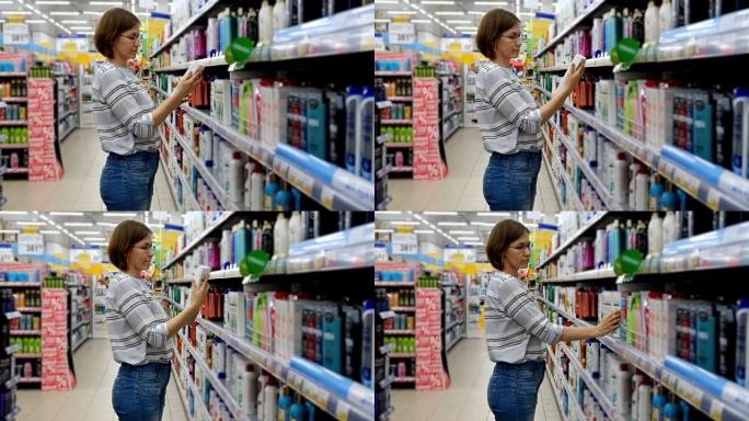 在超级市场上选择洗发水的女人