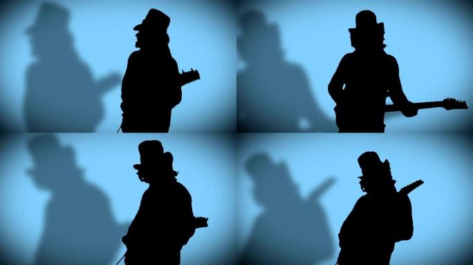 戴帽子的酷酷摇滚吉他手带着他的影子正在蓝色背景上弹奏电吉他