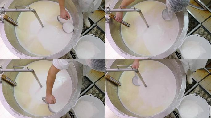 在大锅中混合牛奶-奶酪生产-日记奶酪工厂