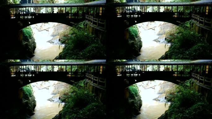 中国古代人行天桥和河流成山洞的剪影