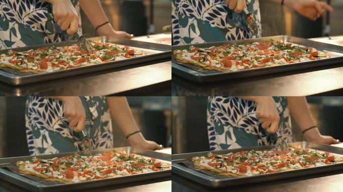 酋长的手在全高清部分切成大披萨