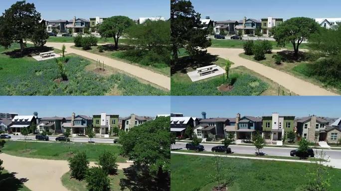 从Bluebonnets到穆勒新开发郊区的太阳能电池板屋顶，朝着房屋发展