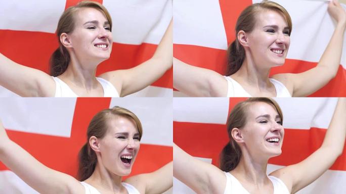 英国年轻女子以慢动作庆祝英格兰国旗