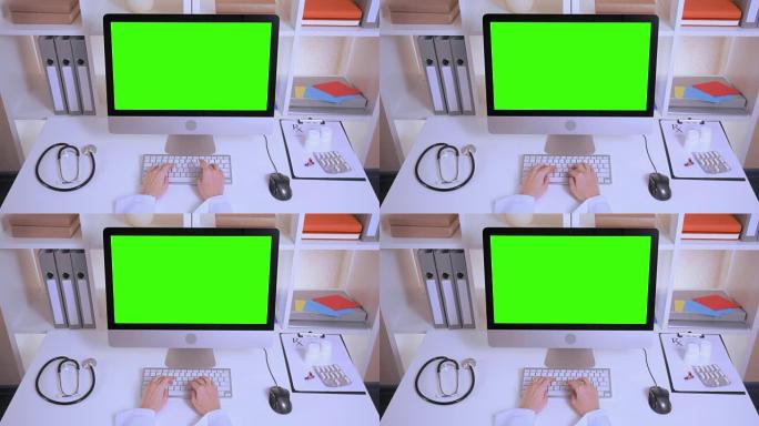 护士在笔记本电脑上输入数据