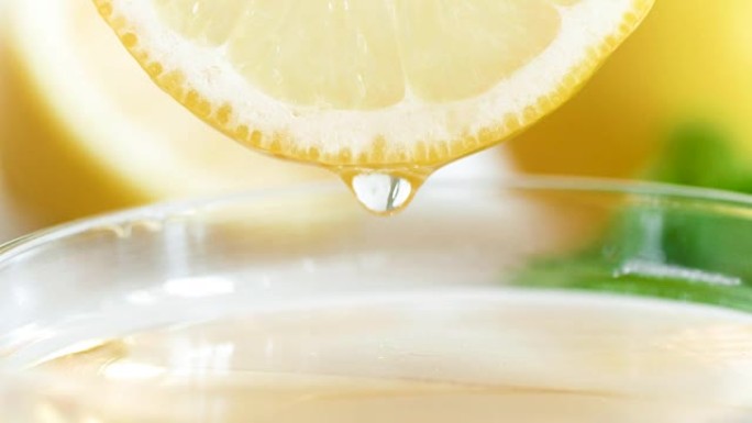 成熟柠檬片上果汁滴的特写全高清视频