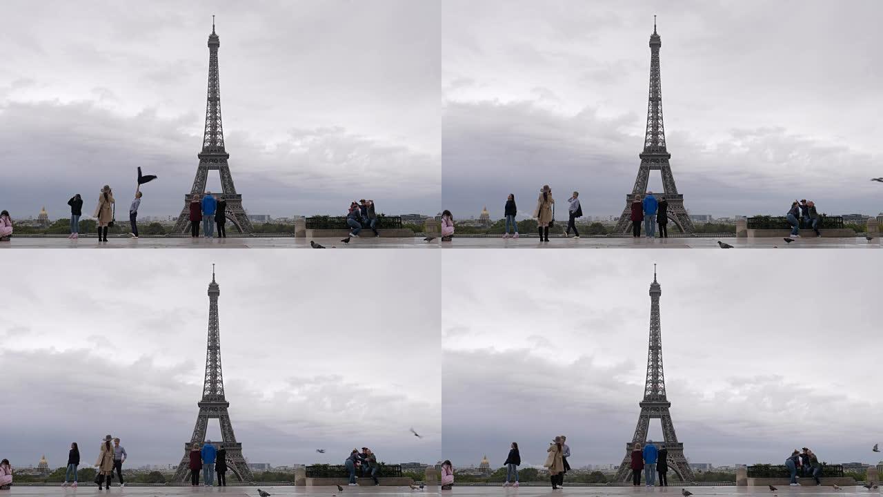 观看点的城市游客在巴黎埃菲尔铁塔拍摄