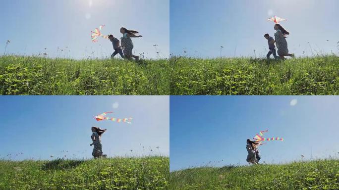 男孩和女孩喜欢放风筝跑步