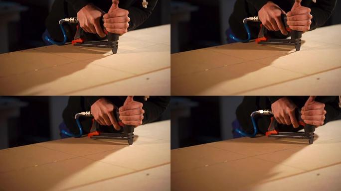 close up shot of a man's hands, who uses carpentry