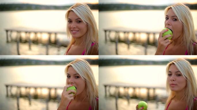 绿苹果运动微笑女人的肖像