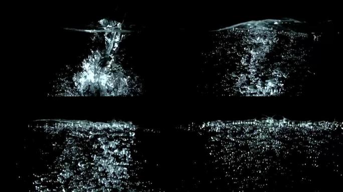 用高速相机慢动作拍摄黑色背景上的水壶开水