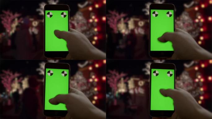 智能手机绿屏chromakey圣诞假期移动人纽约