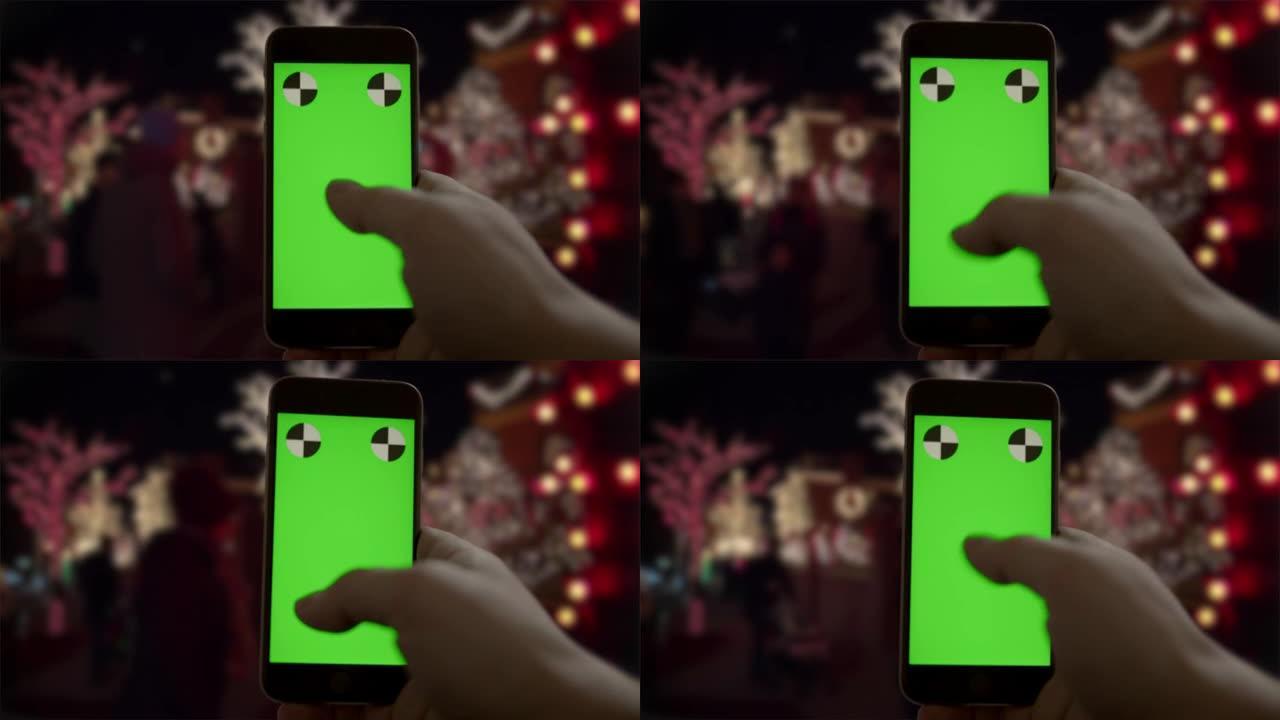 智能手机绿屏chromakey圣诞假期移动人纽约