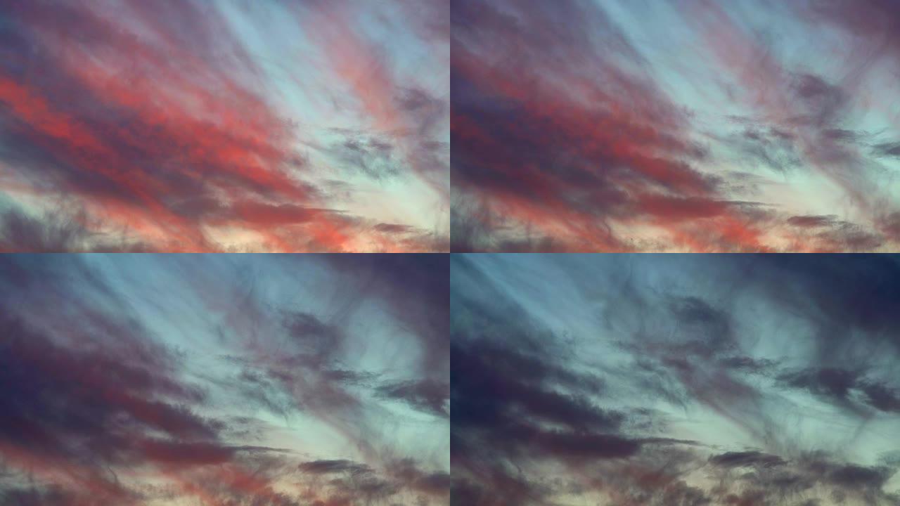时间圈数，一天的日落时分粉红色的云朵在天空中移动