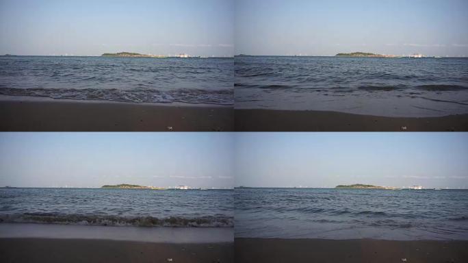 海浪在沙滩上滚动的镜头