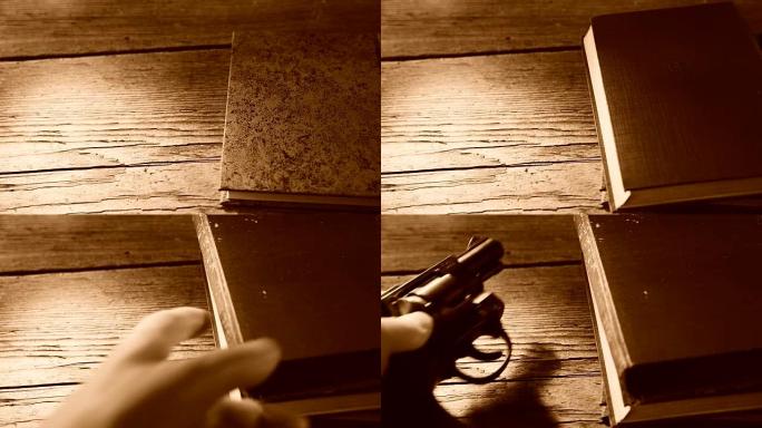 将枪和书放在木桌上，实时，无相机移动
