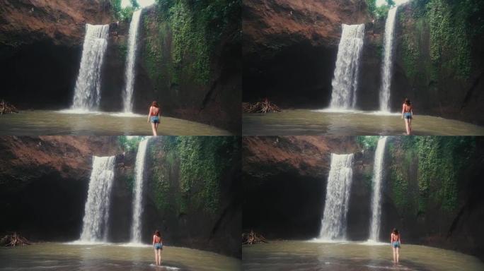 印度尼西亚巴厘岛Tibumana瀑布附近的女人