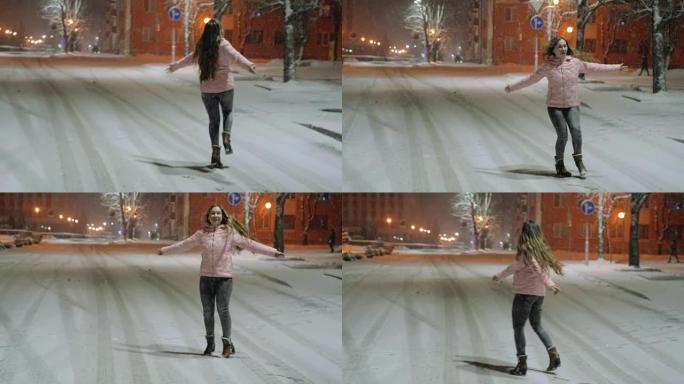 一个年轻幸福的女人在冬季城市的肖像。女孩走在街上，享受雪