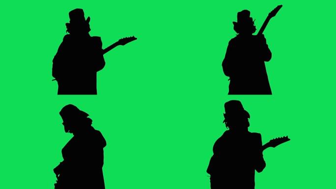 帽子里的酷摇滚吉他手在绿屏上弹奏电吉他