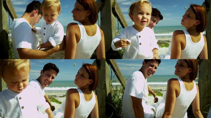 快乐的年轻高加索家庭一起享受海滩度假