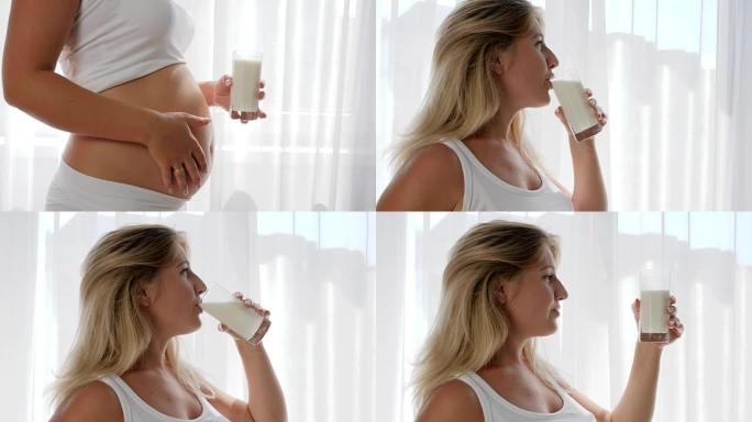 孕妇在室内大肚享受牛奶营养奶制品