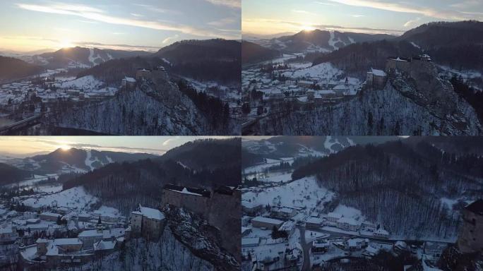 Aerial view above Orava castle in sunset winter ev