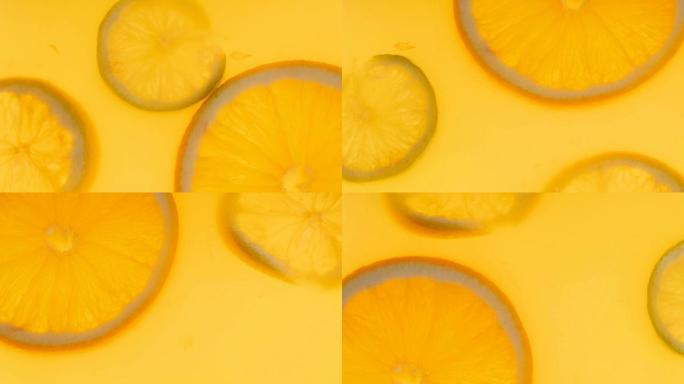 新鲜橙汁中漂浮的柑橘切片的特写全高清镜头