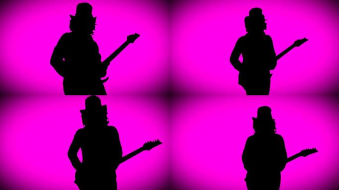 帽子里的酷摇滚吉他手正在粉色背景上弹奏电吉他。
