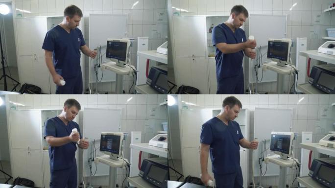 医院的外科医生在超声波机器上对器官进行研究。医生在医院或诊所展示医疗工具