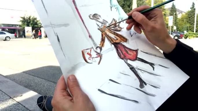 成年女性时装设计师在城市街道上绘制草图