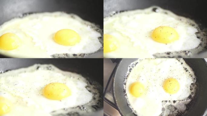 煎锅煎鸡蛋，撒上香料，慢动作