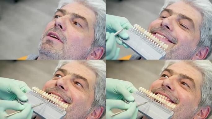 牙医检查年轻人牙齿颜色的影像