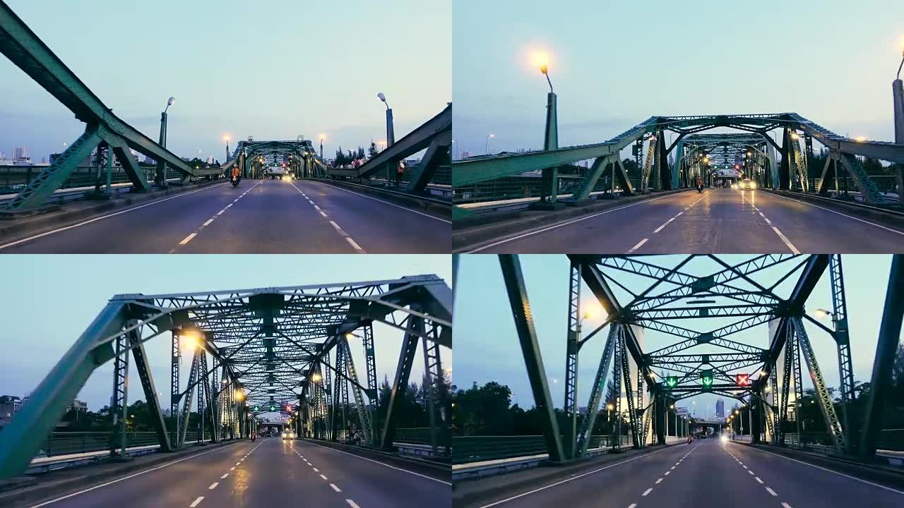 泰国曼谷-2018年6月02日: 日落时间交通多种类型的汽车在河上的桥上行驶，在Phra Phutt