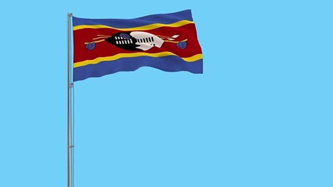 在蓝色背景上随风飘扬的旗杆上隔离埃斯瓦蒂尼-斯威士兰王国的旗帜，3d渲染