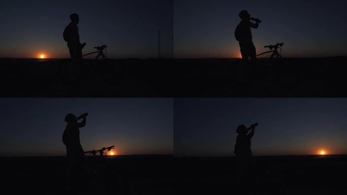 一个年轻人在日落时积极地花时间骑自行车