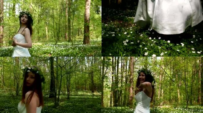 春天森林里穿着白色婚纱的美女。