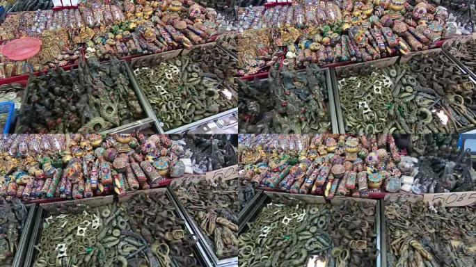 市场上的泰国护身符。宗教佛教护身符保护和好运