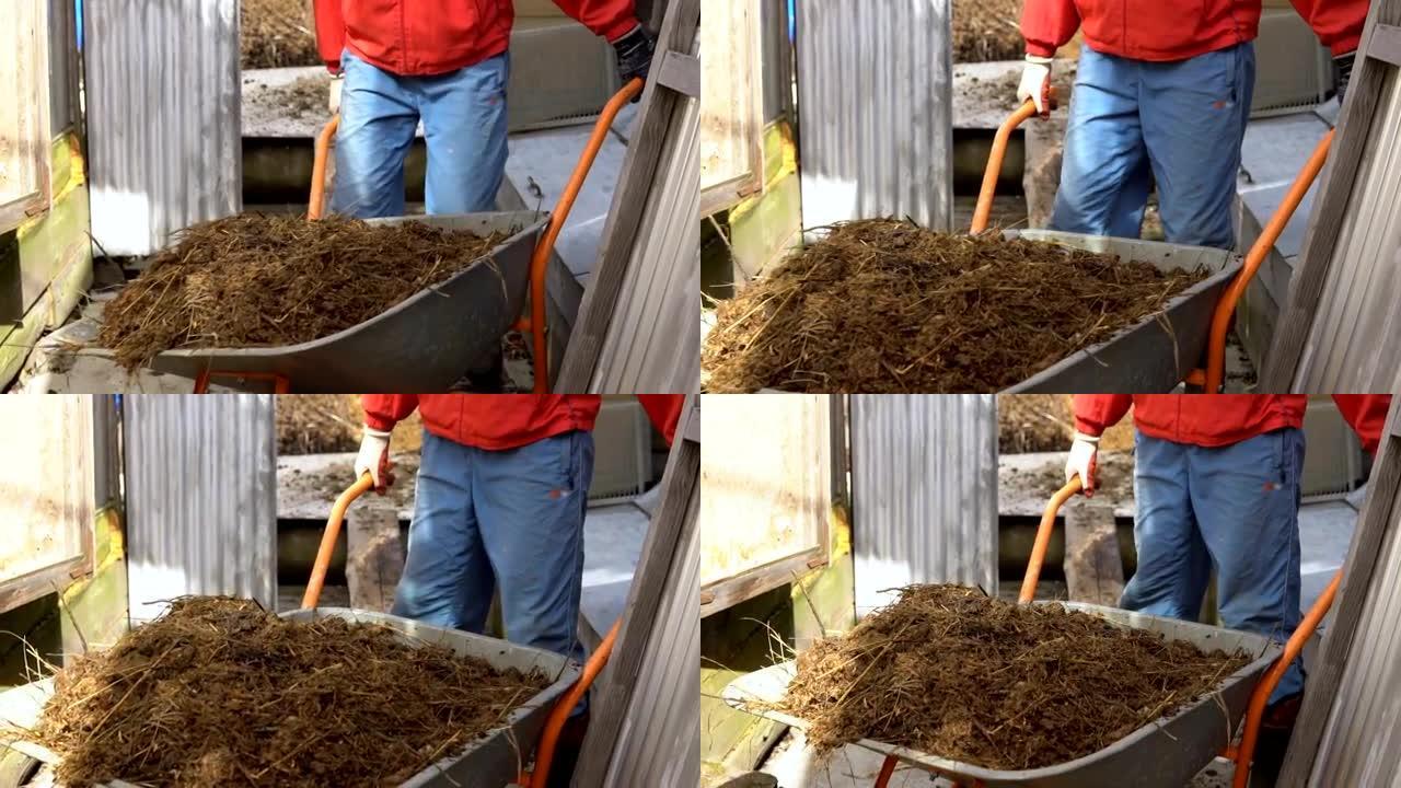 一个人用手推车搬运肥料。