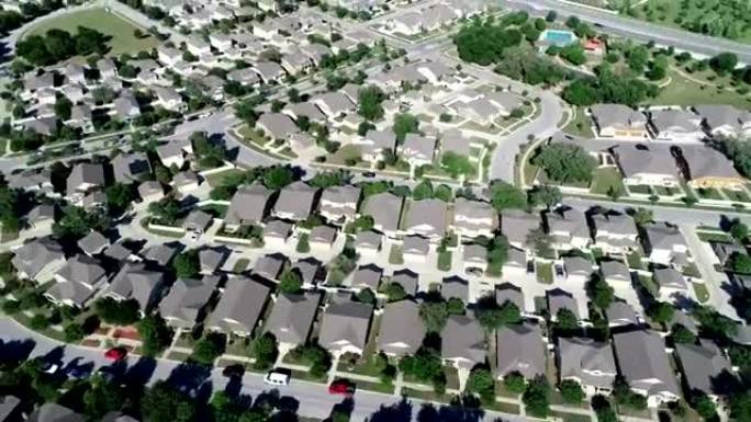 备份并平移到德克萨斯州岩石郊区房屋空中无人机周围数百万房屋的整个视野