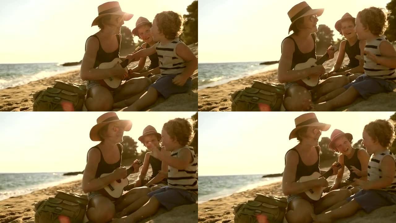 母亲在海滩上和男孩们弹吉他