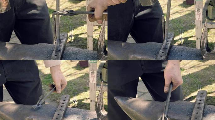 铁匠用铁锤在铁砧上锻造