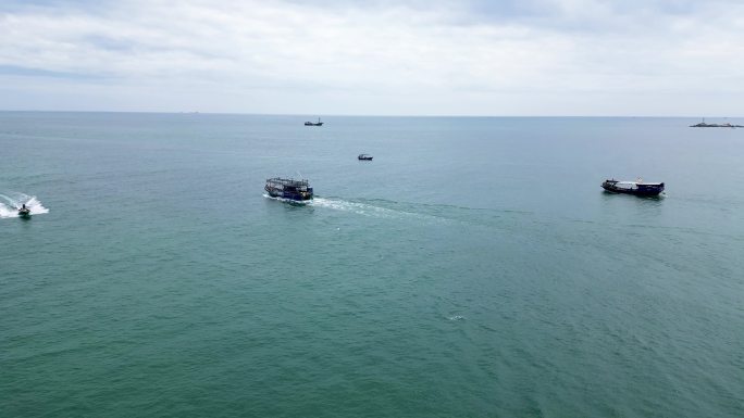 电白架海无人机跟随出海渔船素材