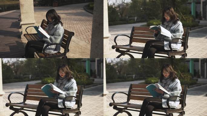 女生坐在长椅看书
