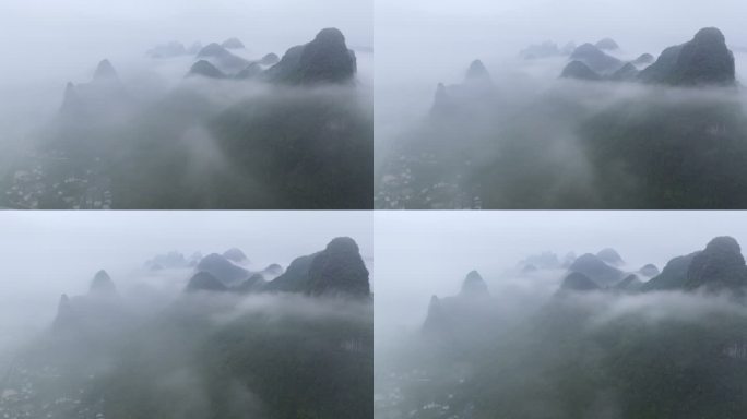 春天雨后喀斯特山峰间漂浮的云雾