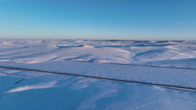 航拍4K东北垦区田野雪景暮色