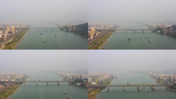 烟雨朦胧的西江河江面船只航拍