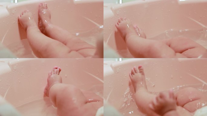 婴儿澡盆洗澡玩水视频素材